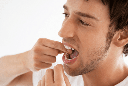 como usar hilo dental